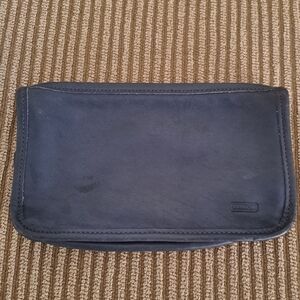 Coach navy blue leather cosmetic bag with brass zipper